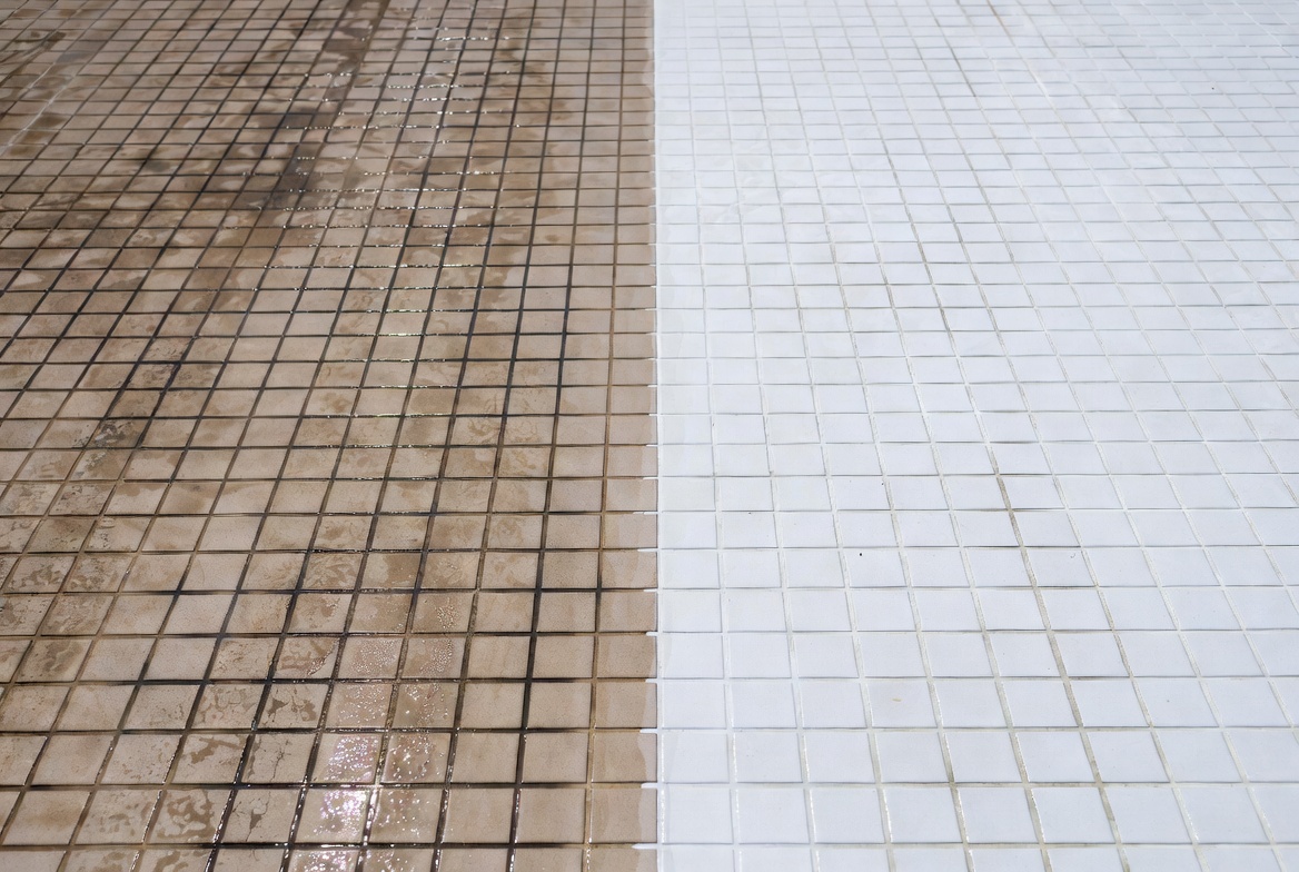 Before and after commercial grout and tile cleaning showing dirty vs restored bright white grout